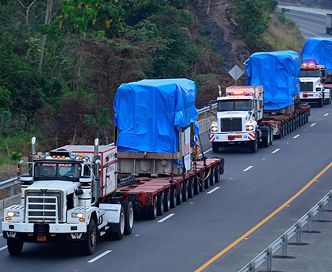 Banner del sector minería con transporte especializado para proyectos mineros